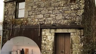 Man buys an old, crumbling stone cottage in his village and turns it into a stylish tiny home